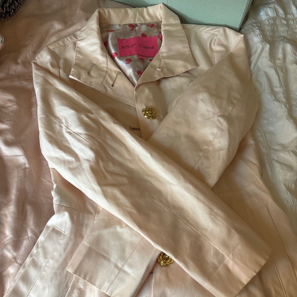 Pale pink rain coat